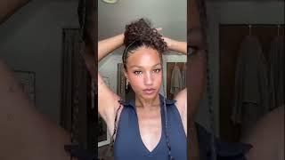 Messy bun with hanging braids ????????#curlyhairstyles